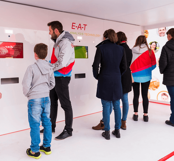 People viewing a machine display