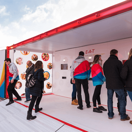 People viewing a machine display